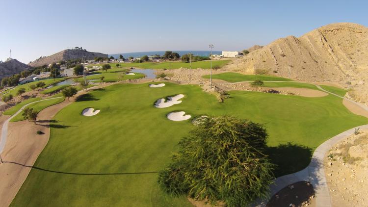 Golf de Ras Al Hamra à Muscat. Gree et vue sur mer