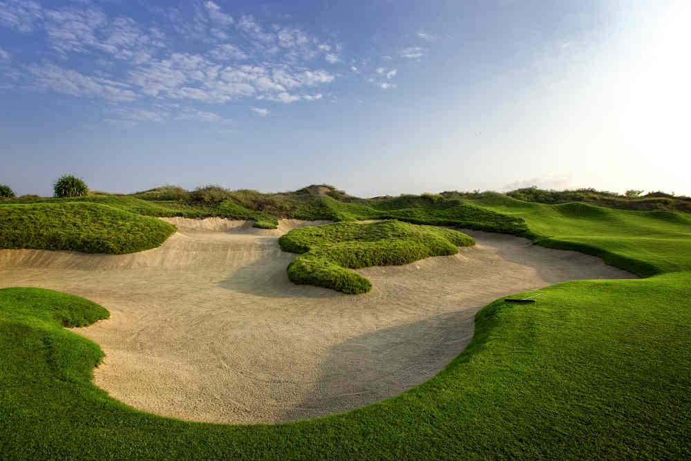 Large bunker Golf de Muscat Hills avec votre pro